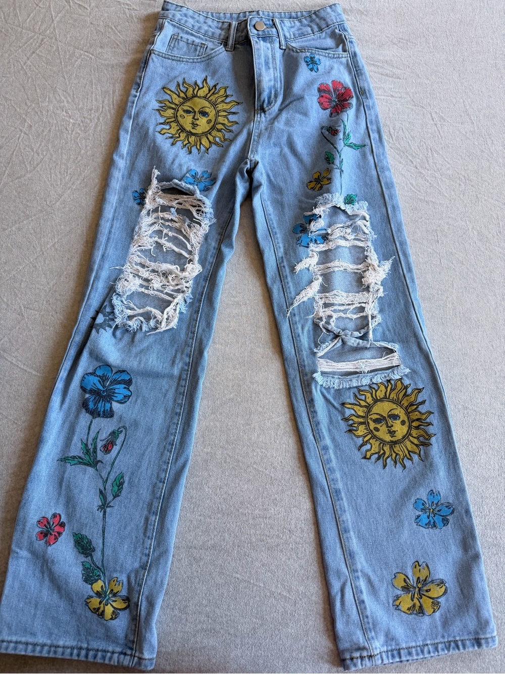 SHEIN Light Blue Distressed Flare Jeans with Sun & Floral Embroidery